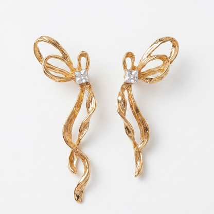 HALF & HALF BOW EARRINGS
