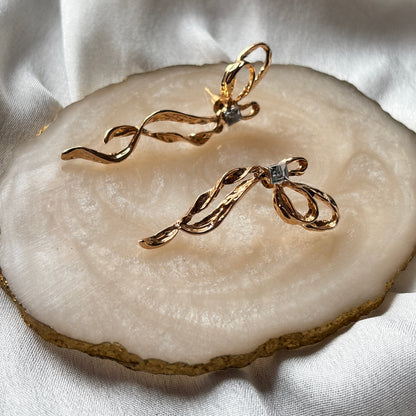 HALF & HALF BOW EARRINGS
